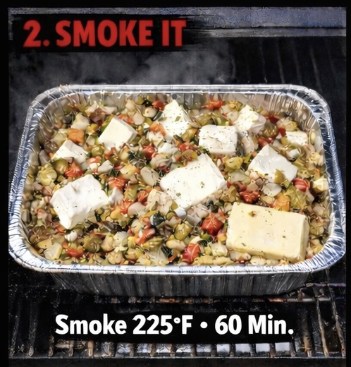 A foil pan filled with chopped vegetables and large chunks of white cheese sits on a grill. Text reads: 2. SMOKE IT. Smoke 225°F • 60 Min. Steam rises around the pan, indicating smoking in progress.