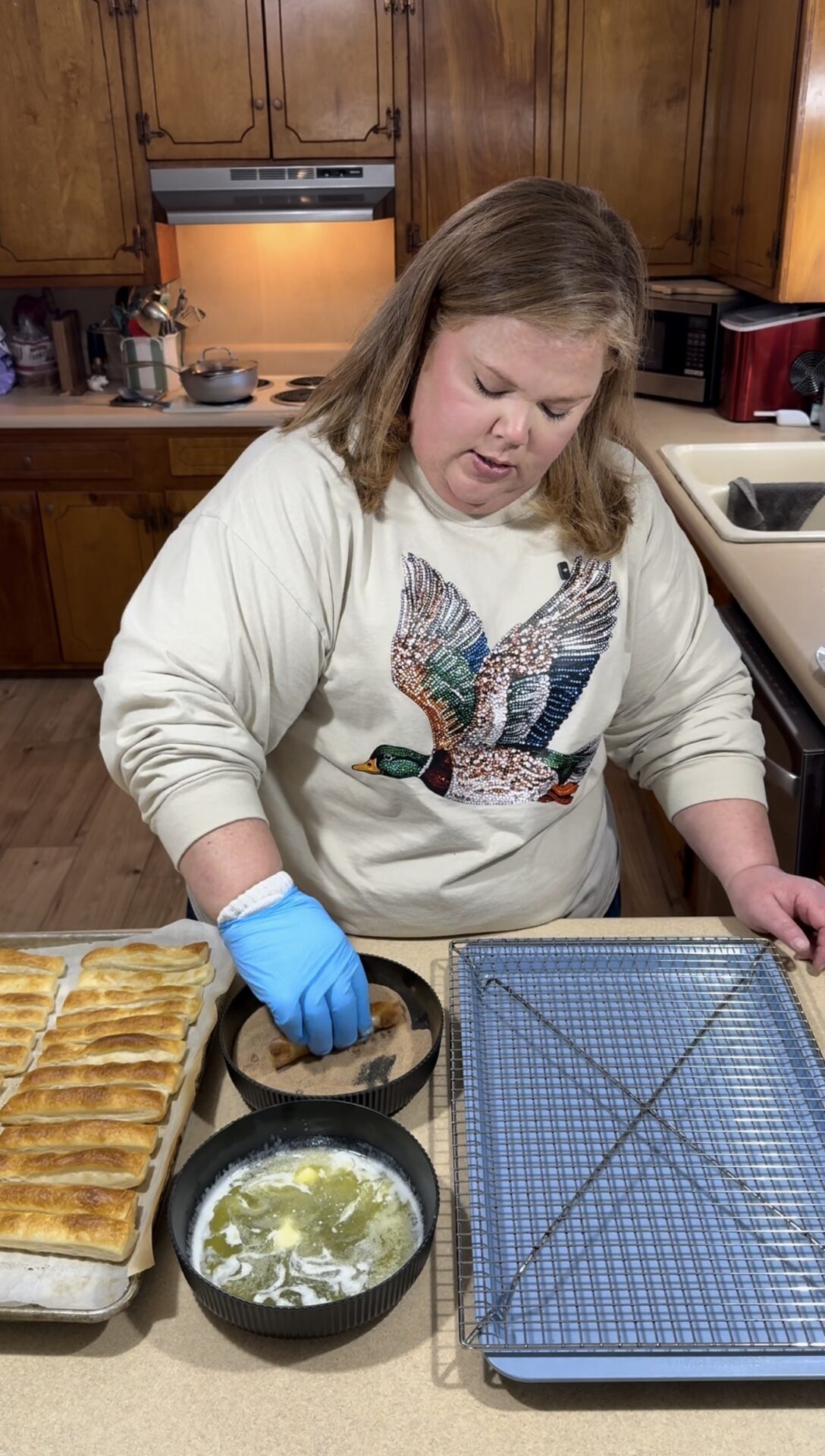 A woman in a kitchen.