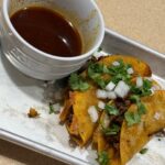 Brisket Birria Tacos with Quesadilla Cheese
