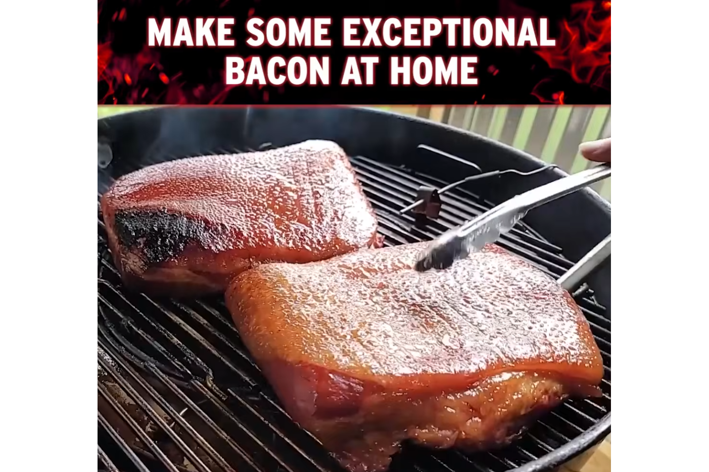 Two thick slabs of bacon are being smoked on a grill, with metal tongs touching one piece. The top of the image has the text MAKE SOME EXCEPTIONAL BACON AT HOME in bold red and white letters.