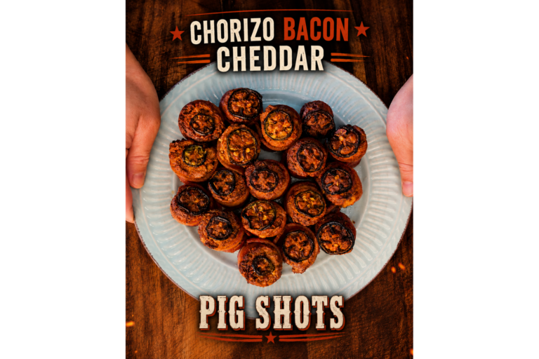 A plate of pig shots, which are bite-sized appetizers made with chorizo, bacon, and cheddar, held by two hands over a wooden table. Text reads: Chorizo Bacon Cheddar Pig Shots..